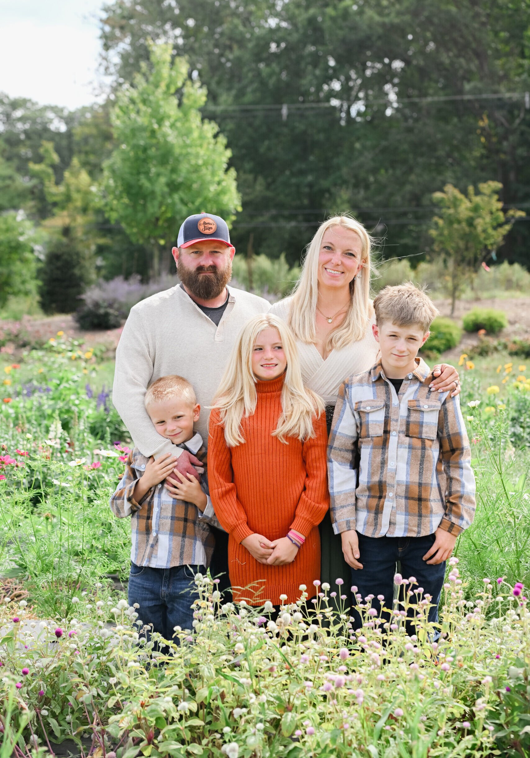 Jim Jr. (4th Generation), wife Anna, and kiddos